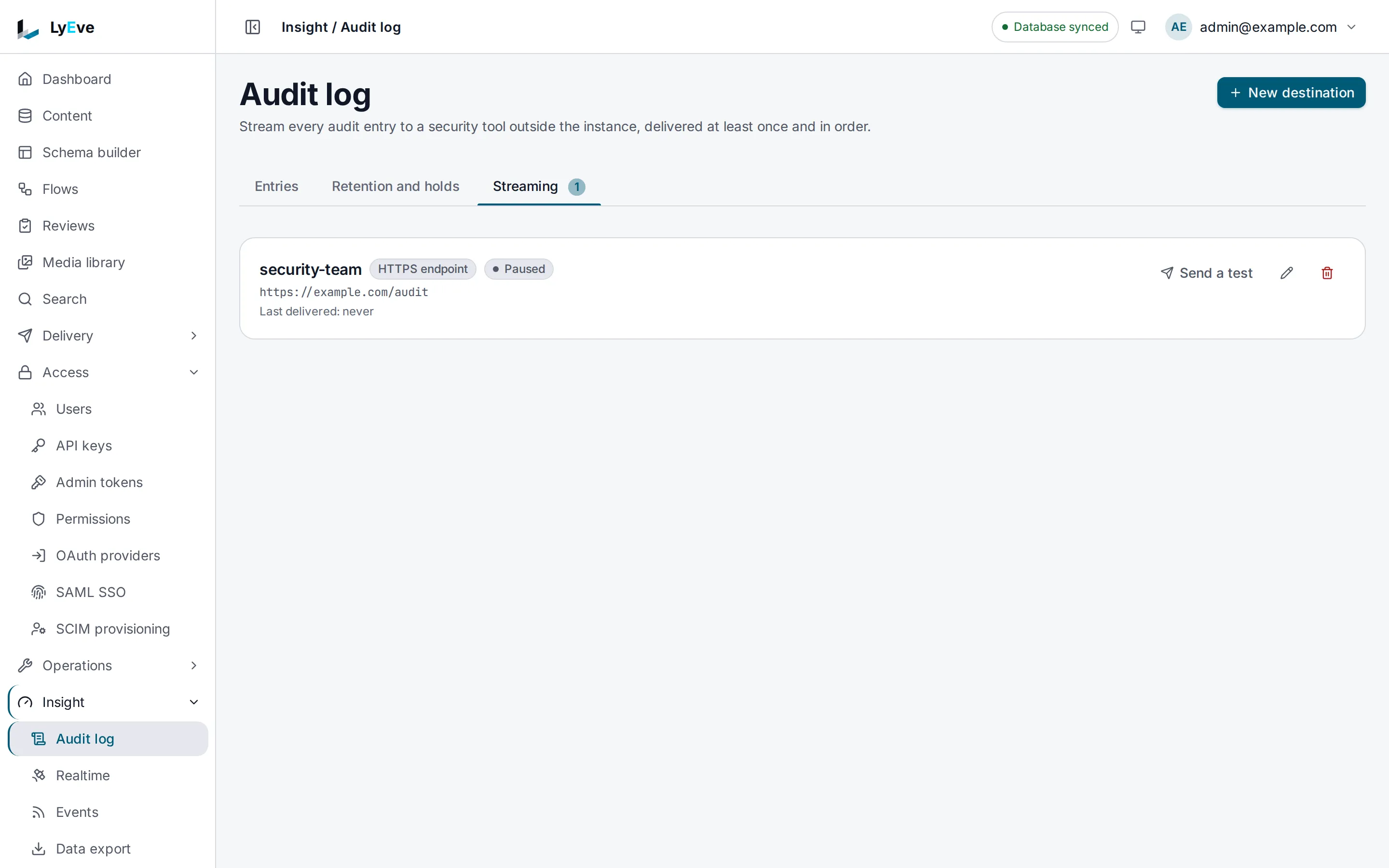 The Streaming tab of the audit log with one paused HTTPS stream named security-team, pointed at https://example.com/audit and never delivered, with Send a test, edit and delete buttons.