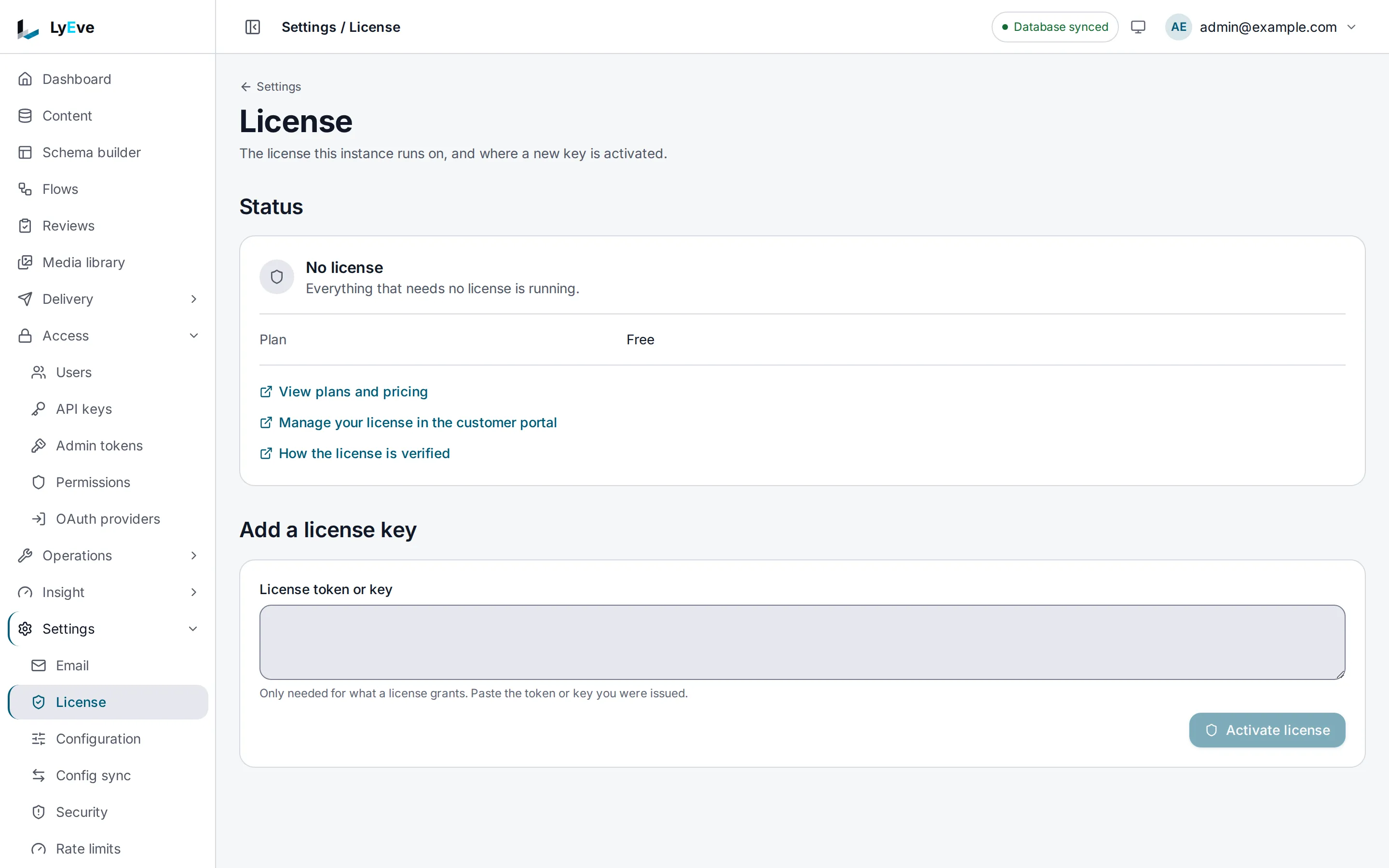 The License page: the current plan and status, links to plans and to the customer portal, and a box to paste a license token or key.